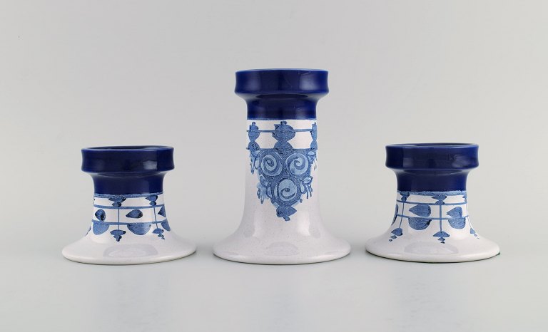 Bjørn Wiinblad (1918-2006), Denmark. Three candlesticks in hand-painted and 
glazed ceramics. Model number L77 and L76. Dated 1979-80.
