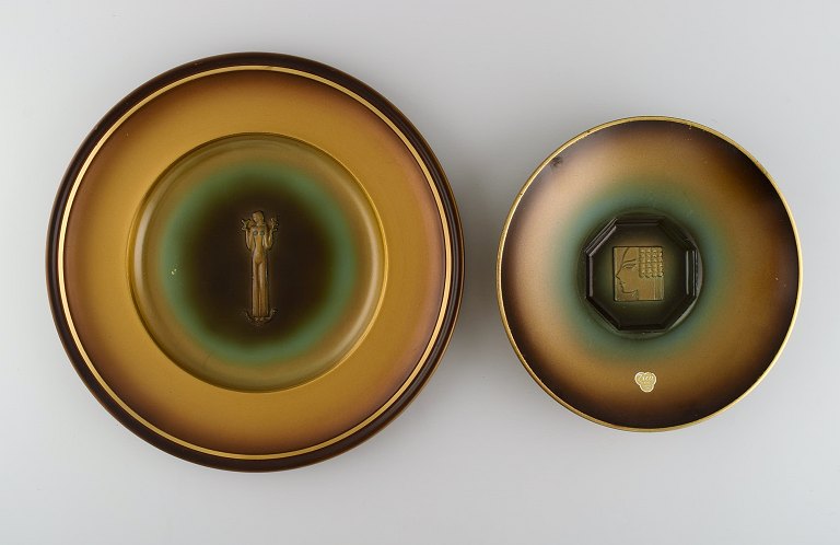 Zicu, Sweden. Two art deco dishes / bowls in patinated metal. Woman and face in 
relief. Mid 20th century.
