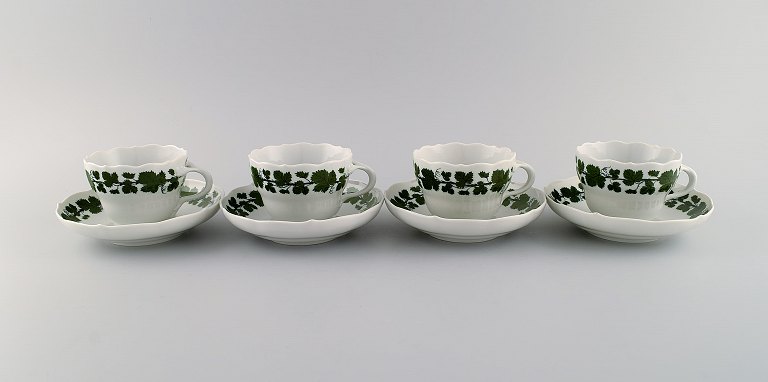 Four Meissen Green Ivy Vine coffee cups with saucers in hand-painted porcelain. 
1940