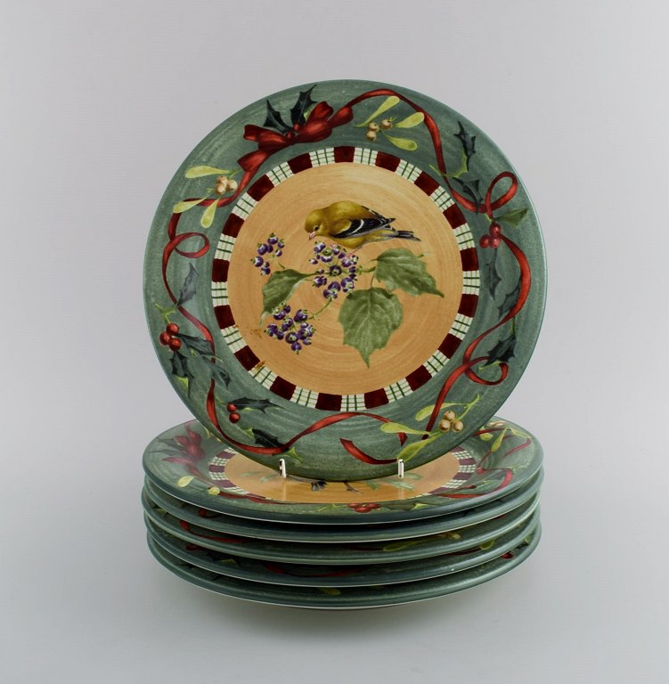 Catherine McClung for Lenox. "Winter greetings everyday". Six dinner plates in 
glazed stoneware decorated with mistletoe, birds and red ribbon. Approx. 2000.
