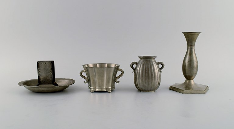 Just Andersen (1884-1943), Denmark. Art deco tin candlestick, match box holder 
and two vases. 1930s/40s.
