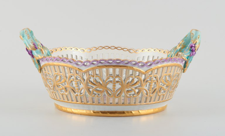 KPM, Germany. Large impressive and openwork bowl hand-painted with fruits.