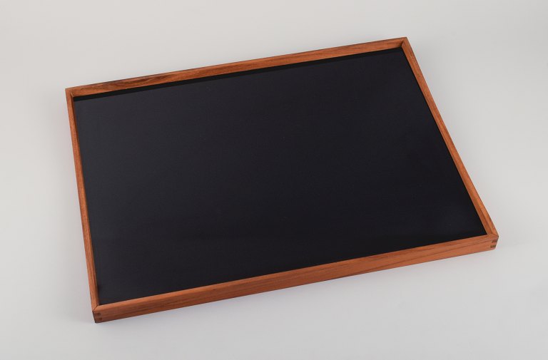 Finn Juhl, Turning Tray, teak tray with black/white laminate.
Designed at Architectmade.