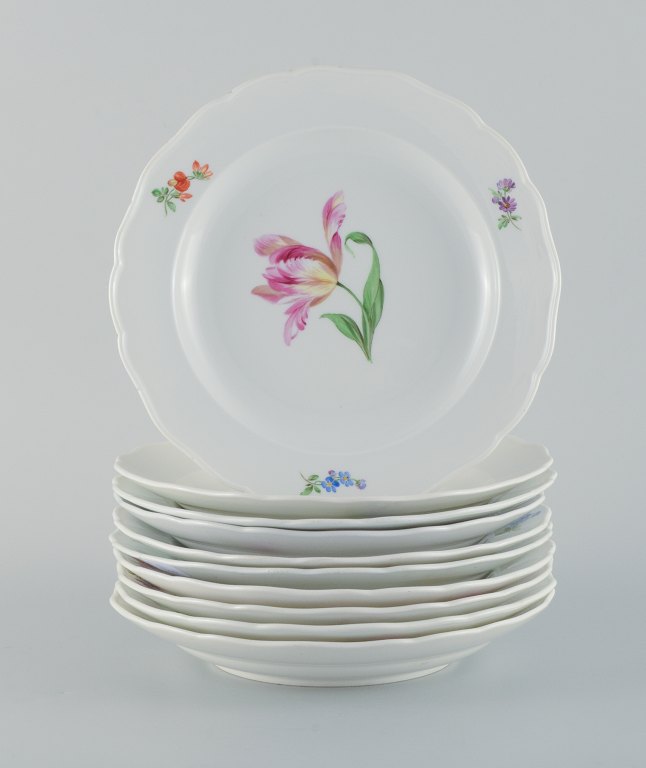Ten antique Meissen dinner plates.
Hand painted with various polychrome flowers.