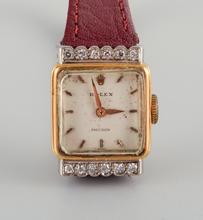 Rolex, Precision. 18 karat guld dame-armbåndsur isat tolv diamanter.Ca. 1940/50