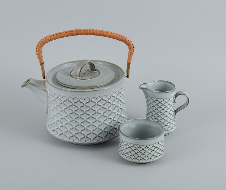 Jens H. Quistgaard (1919-2008) for Bing & Grøndahl / Nissen Kronjyden. Tea 
service in gray "Cordial" consisting of teapot, creamer and a sugar bowl.