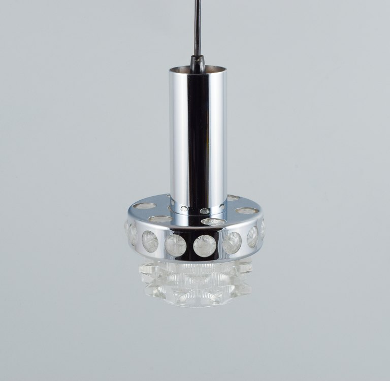 RAAK, Holland. Designerlampe i krom, plast og klart glas.