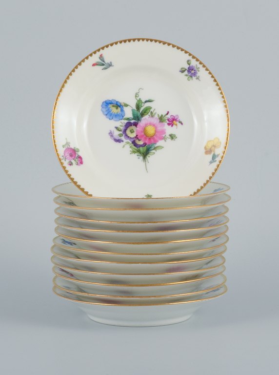 B&G, Bing & Grondahl Saxon flower.
12 cake plates decorated with flowers and gold trim.