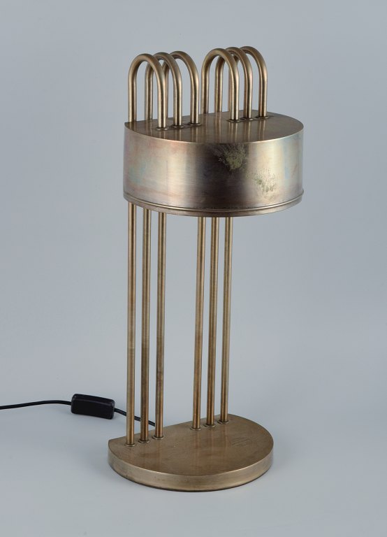 Marcel Breuer table lamp in patinated metal.
Drawn in 1925 for the Paris Exposition.
