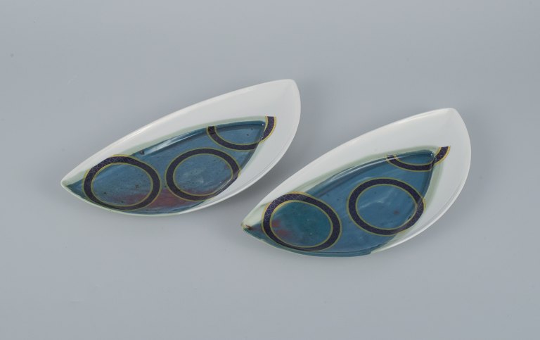 French designer, avant-garde style, two unique plates in hand-painted porcelain.