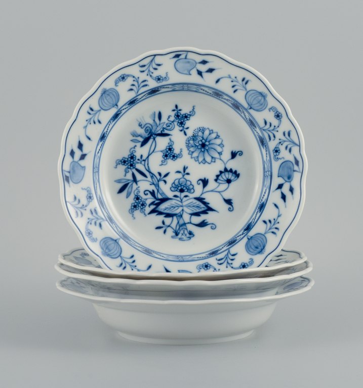 Meissen, a set of four deep plates, hand painted,Blue Onion.