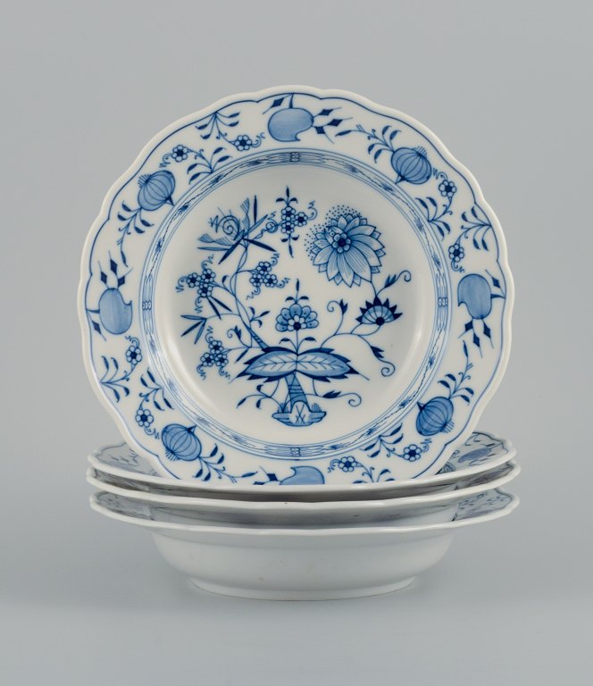 Meissen, a set of four deep plates, hand painted,Blue Onion.
