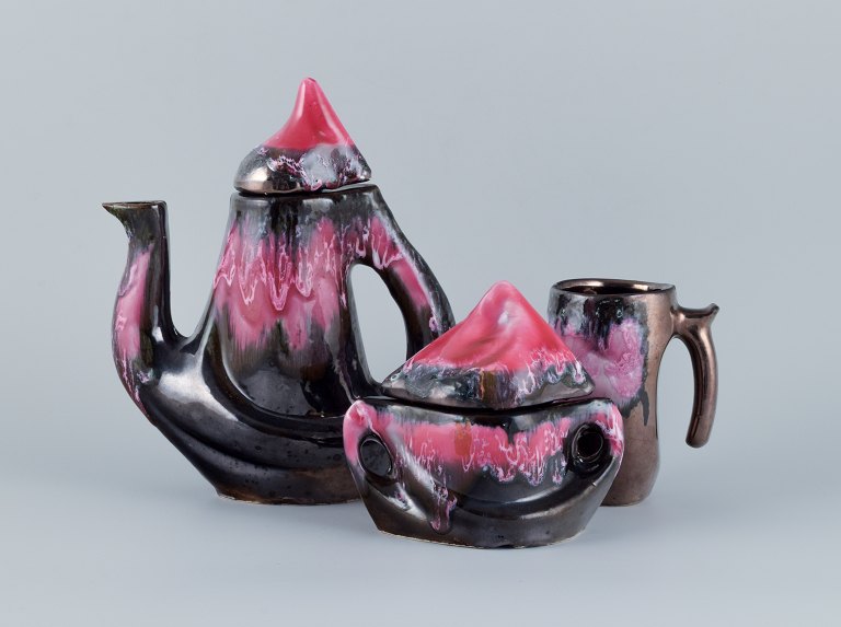 Vallauris, France, coffee pot, lidded bowl and a coffee mug. Luster glaze.