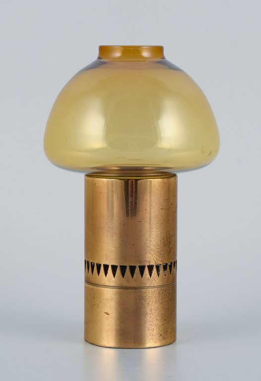 Hans Agne Jakobsson, Sweden, a stand for tealights in brass and smoked glass.