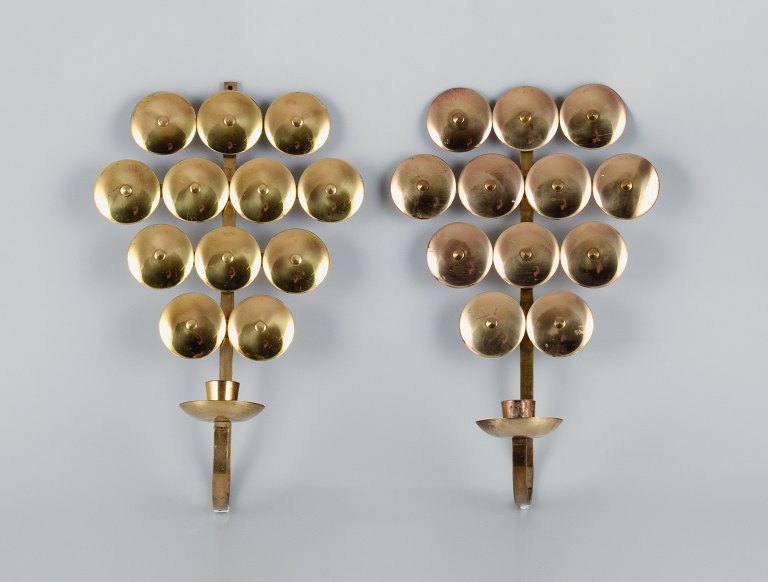 Kee Mora, Sweden, a pair of brass wall sconces, Swedish design.
1960s/70s.