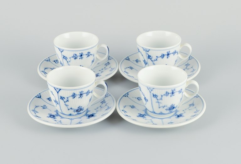 Four sets of Royal Copenhagen Blue Fluted Plain coffee cups and saucers in hand 
painted porcelain. Restaurant porcelain service.