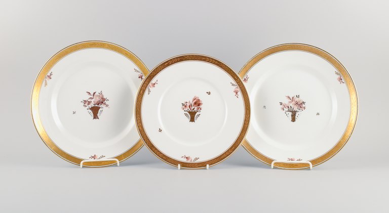 Royal Copenhagen, Gold Basket. Two dinner plates and one lunch plate.