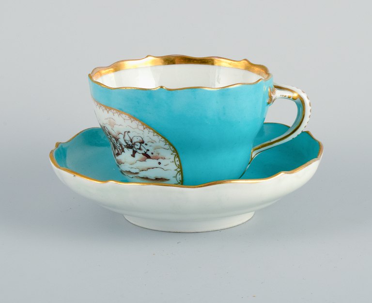 Antique Meissen coffee cup.
Hand painted in turquoise and gold decoration.