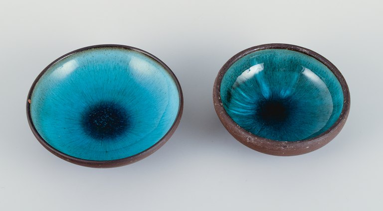 OSA, Denmark.
Two small retro unique ceramic bowls with glaze in turquoise tones.