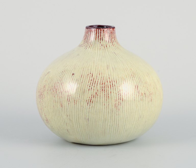 Osa, Denmark.
Unique ceramic vase in cream-colored glaze.