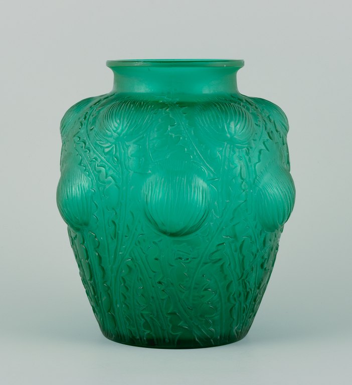 René Lalique, France.
Rare Domremy art glass vase in emerald green with thistles in relief.