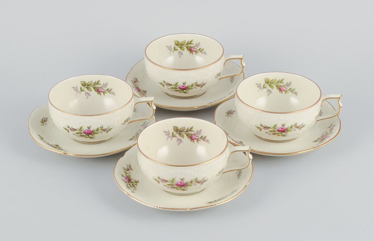 Rosenthal, Germany. "Sanssouci", four cream colored teacups with  saucers 
decorated with flowers and gold.