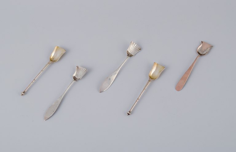 Five Danish silver sugar spoons.