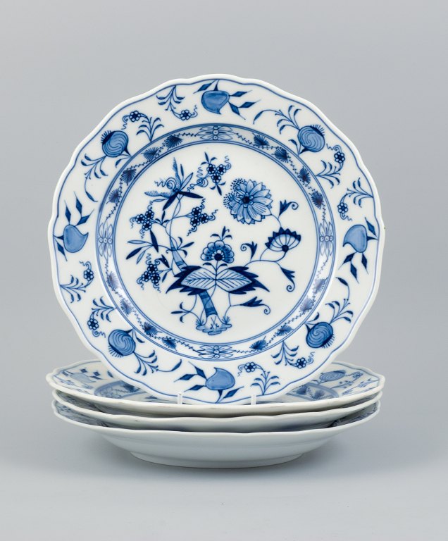 Meissen, Blue Onion pattern, a set of four hand painted dinner plates.