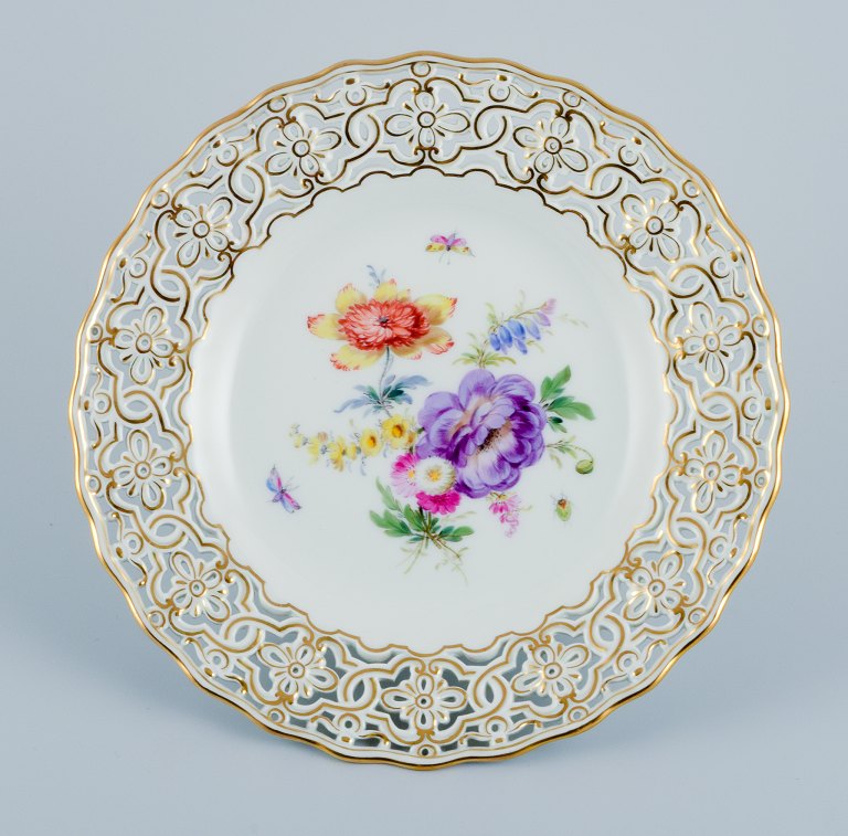 Meissen, Germany, openwork plate hand painted with flowers and butterflies.