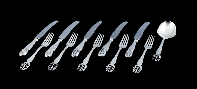 Danish silversmith, dinner service for five people consisting of five dinner 
knives, five dinner forks and a serving spoon.