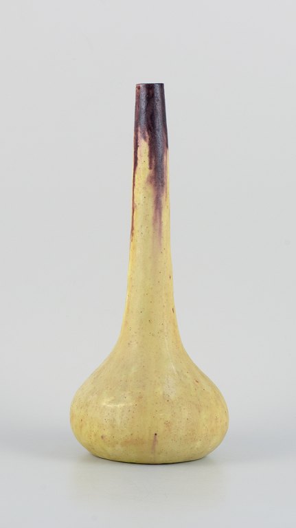 European studio ceramicist, tall narrow-necked unique ceramic vase in yellow and 
brown decoration. Possibly Belgian ceramicist.