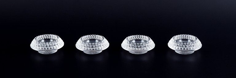 René Lalique, a set of four early and rare "Nippon" salt cellars in art glass.