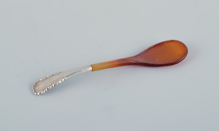 Georg Jensen, Viking, rare salt spoon with amber-colored horn handle.