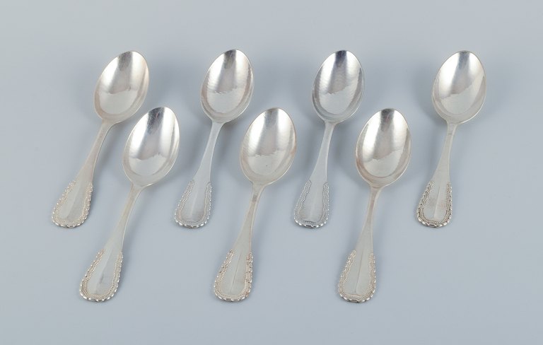Georg Jensen, Viking, a set of seven large dinner spoons in 830 silver.