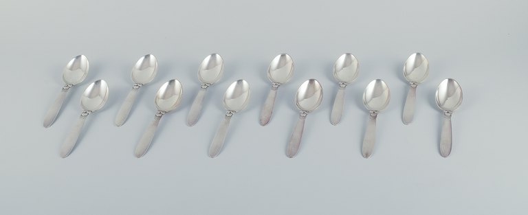 Georg Jensen, Kaktus, a set of twelve sterling silver dessert spoons.
