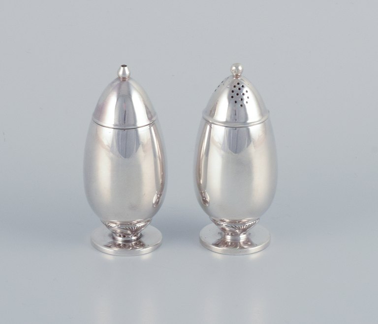 Gundorph Albertus (1887-1970) for Georg Jensen, Denmark, "Cactus" salt and 
pepper shakers in sterling silver.