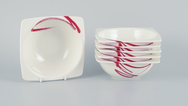 Royal Fine China, a set of six "Paint It Red" porcelain bowls.