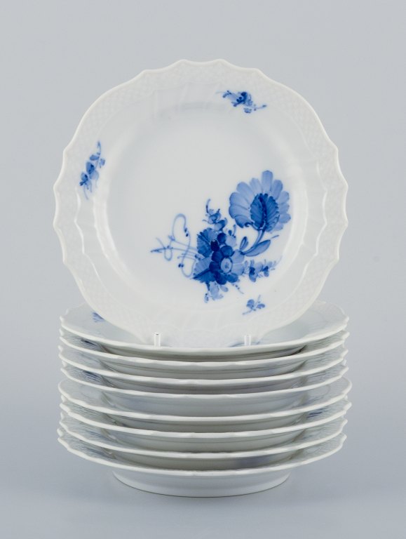 Royal Copenhagen Blue Flower Curved, a set of nine plates.