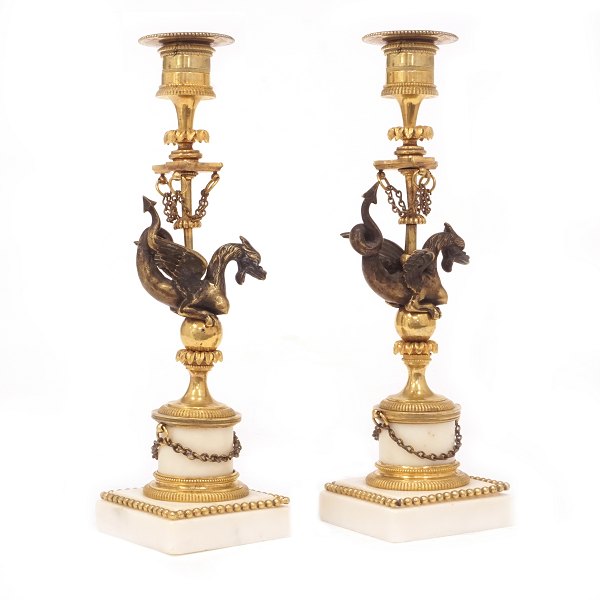 Pair of firegilt bronze candlesticks on a marble base. Sweden circa 1840. H: 
26cm