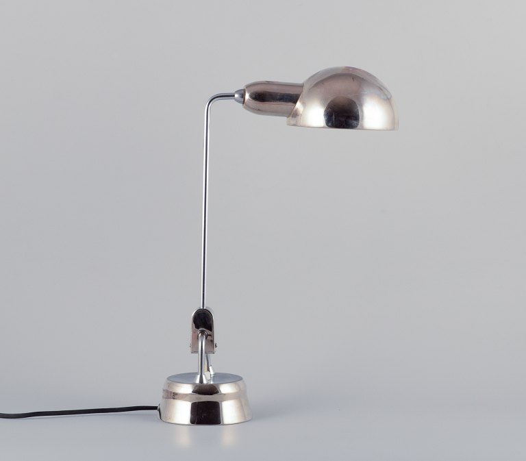 Charlotte Perriand for Jumo, France. Desk lamp in chromed metal.