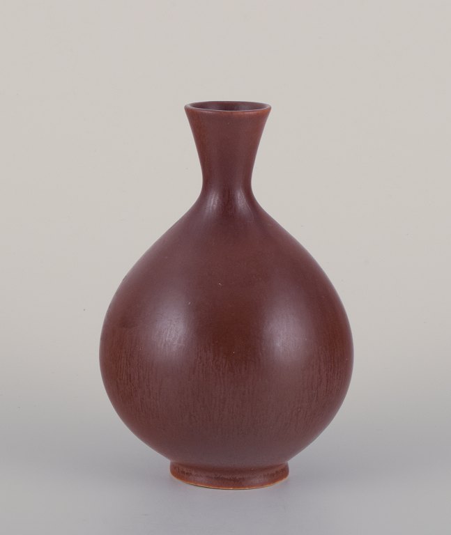 Berndt Friberg for Gustavsberg, Sweden. Ceramic vase with brown glaze. Bulbous 
shape.