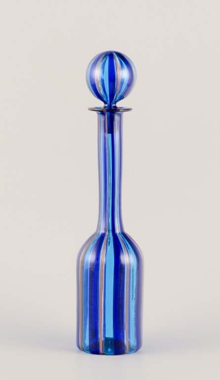 Murano, Italy. Art glass decanter with a striped design.
Blue tones with gold stripes.