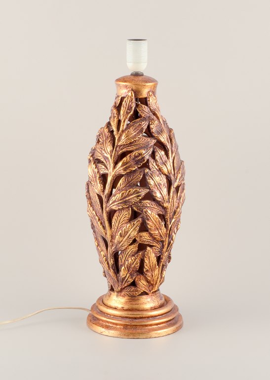 Large Italian ceramic table lamp. Shaped like branches with gold decorations.