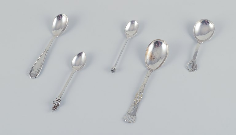 Danish silversmiths, including Heimbürger and others. Set of five assorted 
spoons in 830 silver and sterling silver.