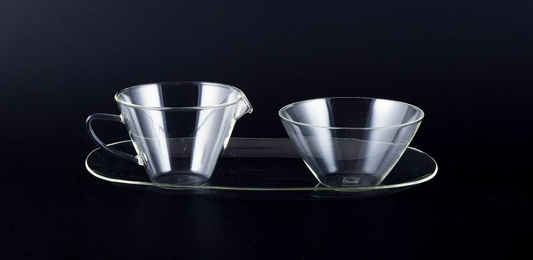 Jena-Glas, Schott & Gen/Mainz, Germany. Creamer and sugar bowl on a tray.