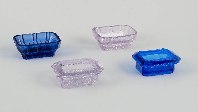 Fåglavik Glasbruk (1874-1980), Sweden.
Four salt cellars in colored glass. Handmade blue and purple glass.