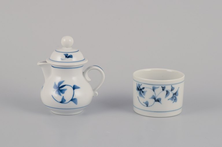 Gertrud Vasegaard for Royal Copenhagen "Noblesse."
Small lidded milk jug and a sugar bowl.