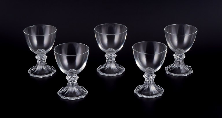 Val St. Lambert, Belgium. A set of five red wine glasses in clear mouth-blown 
crystal glass.