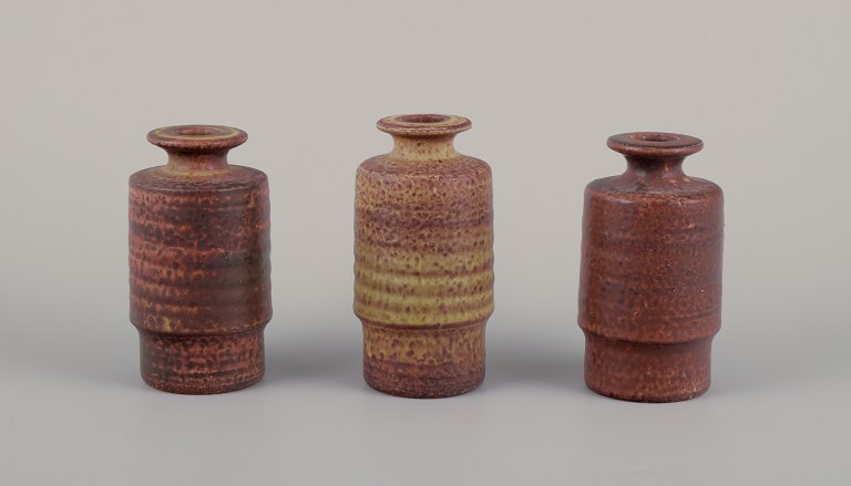 Mobach, Netherlands, three unique vases in glazed ceramic. Glaze in brown-green 
tones.