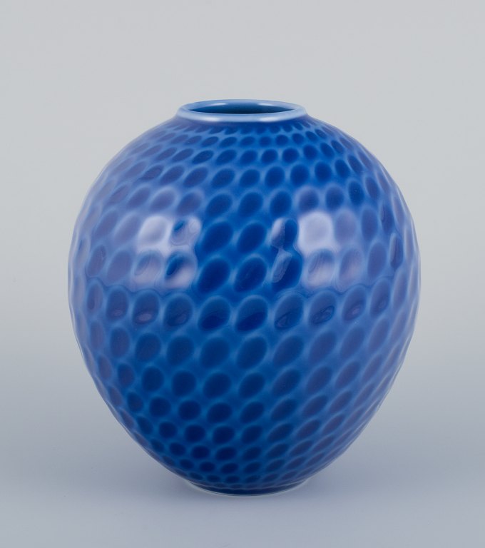 Maria Torstensson for Royal Copenhagen, porcelain vase with glaze in blue 
shades. Drop-shaped decoration.